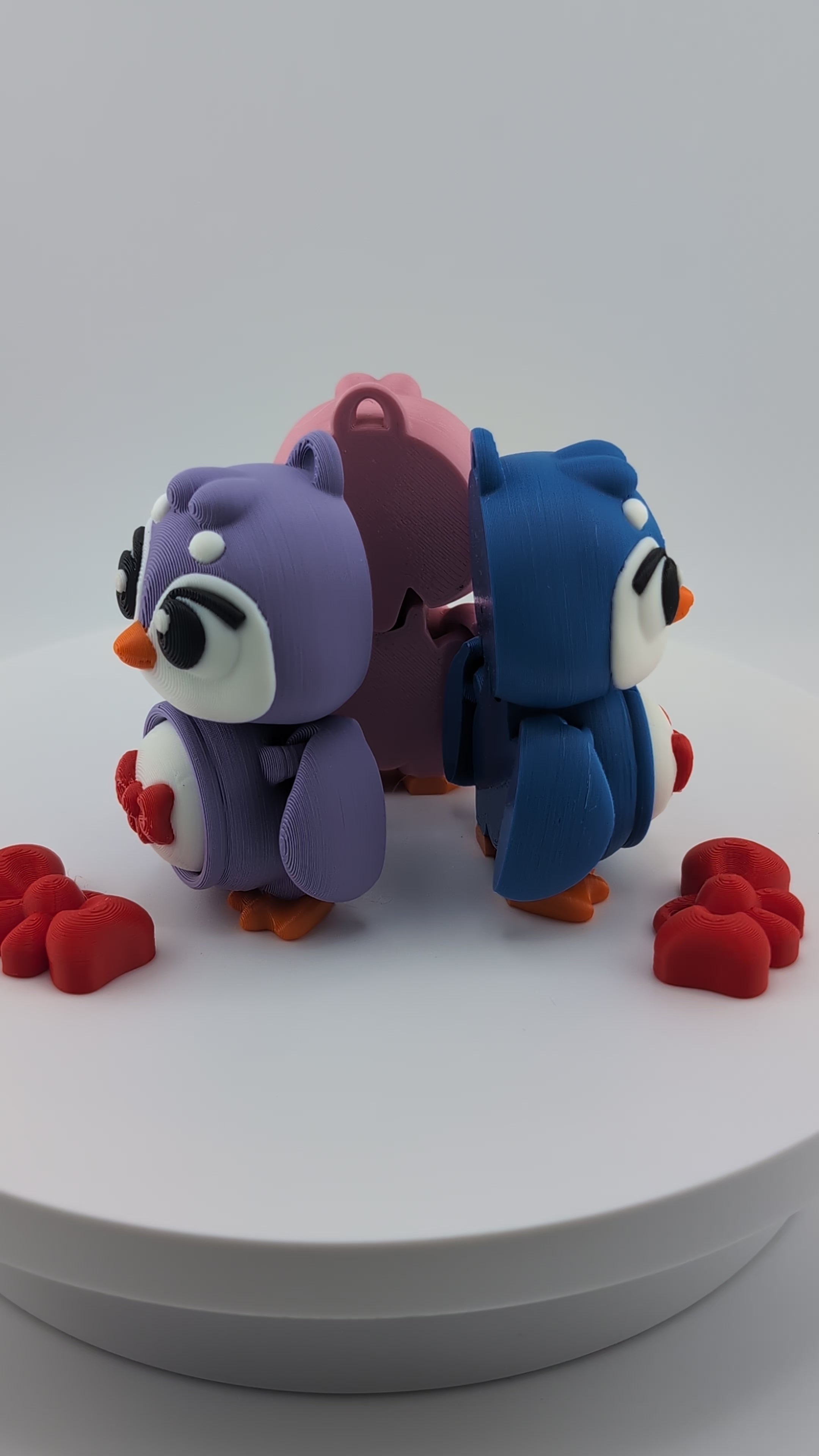 Waddle into fun with our Penguin Clicker Keychains!