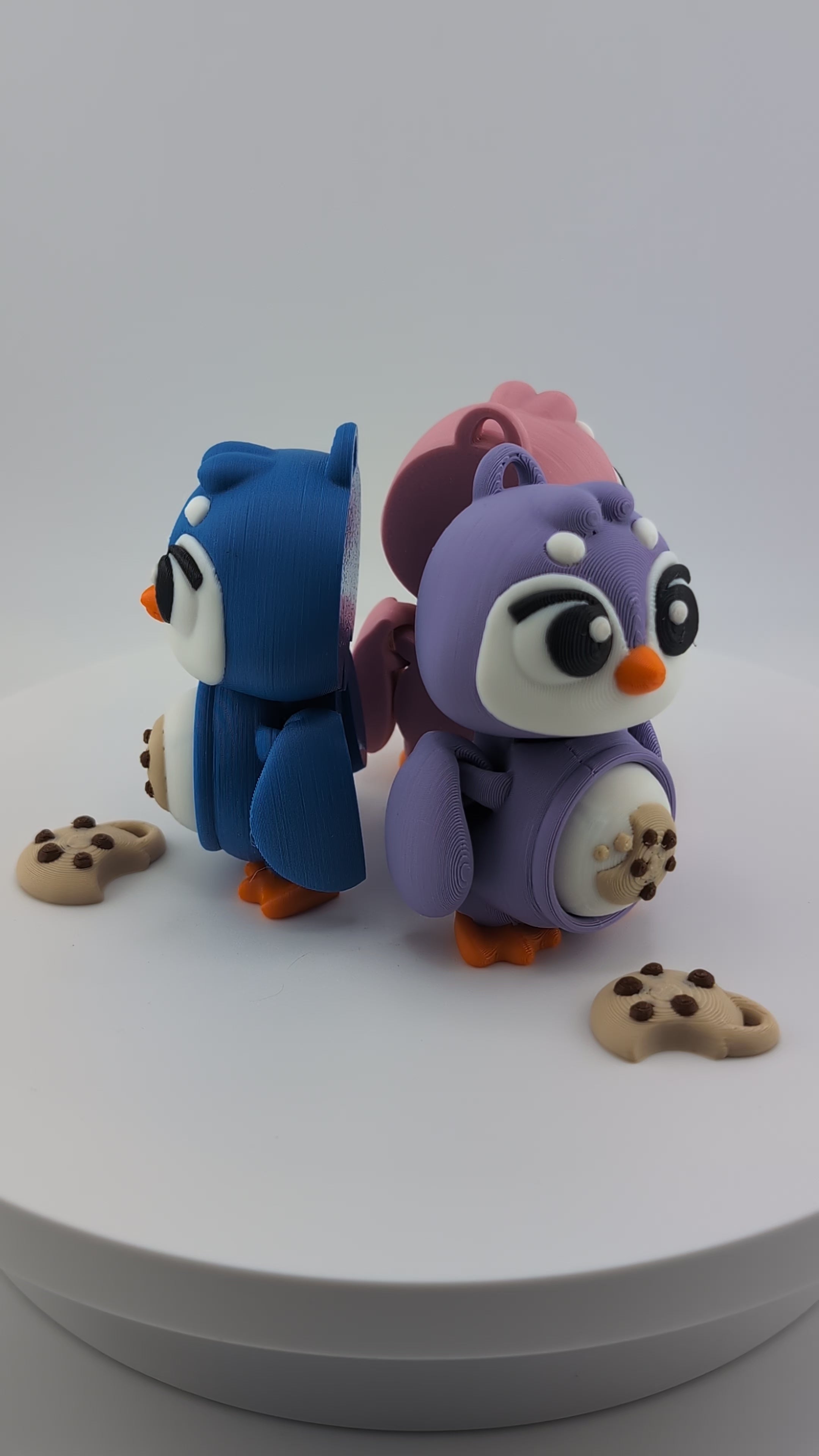 Waddle into fun with our Penguin Clicker Keychains!