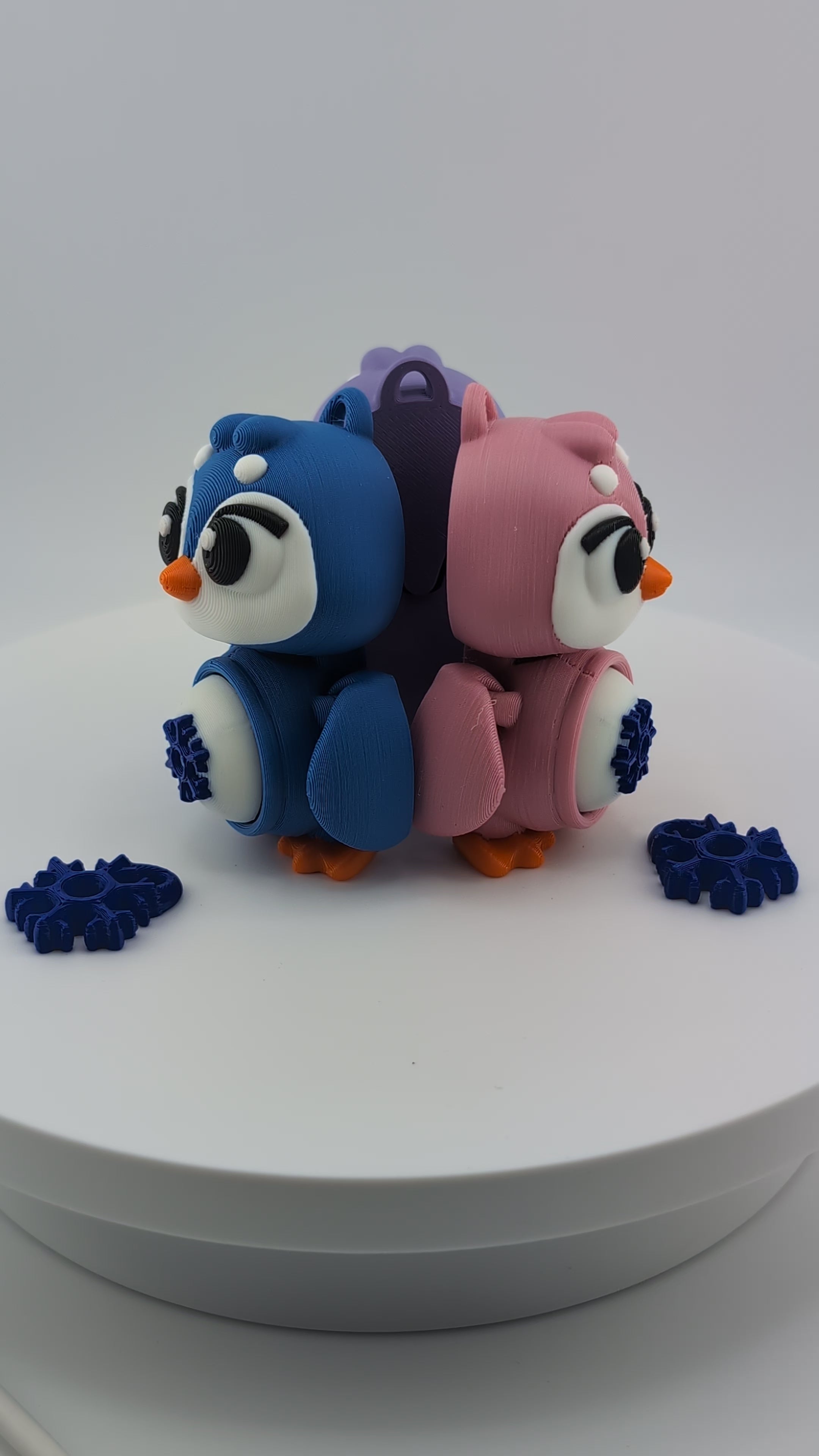 Waddle into fun with our Penguin Clicker Keychains!
